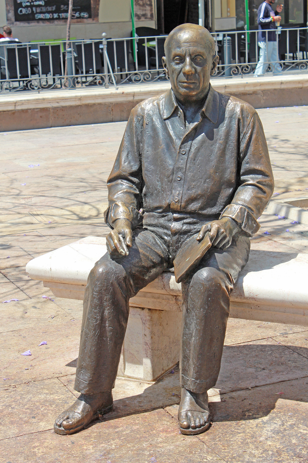 Life-size bronze statue of Pablo Picasso in Plaza de la Merced, adjacent to his family home