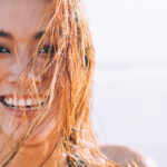 Young girl with smile who has been swimming