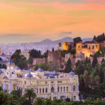 Malaga city skyline at sunset