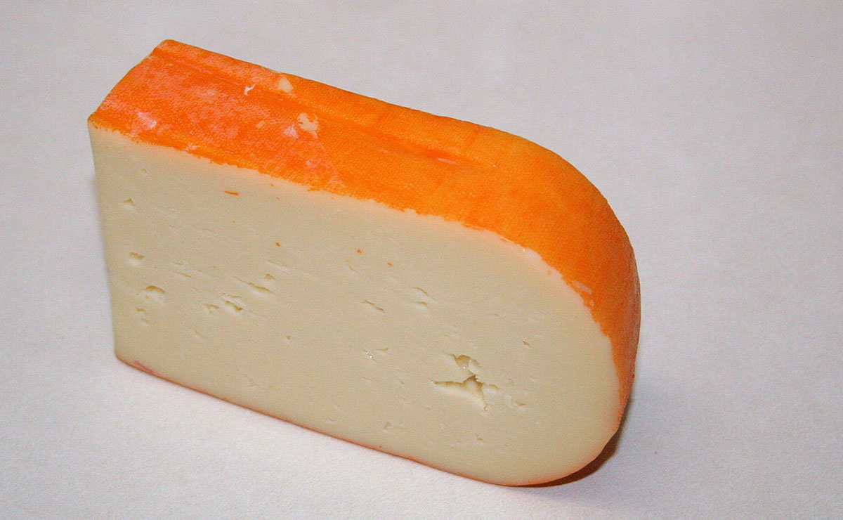 Mahón cheese is distinctive as it is hand-rubbed with either butter, oil or paprika during maturation